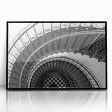 Large abstract wall art featuring a spiral staircase design in black and white tones, framed acrylic.
