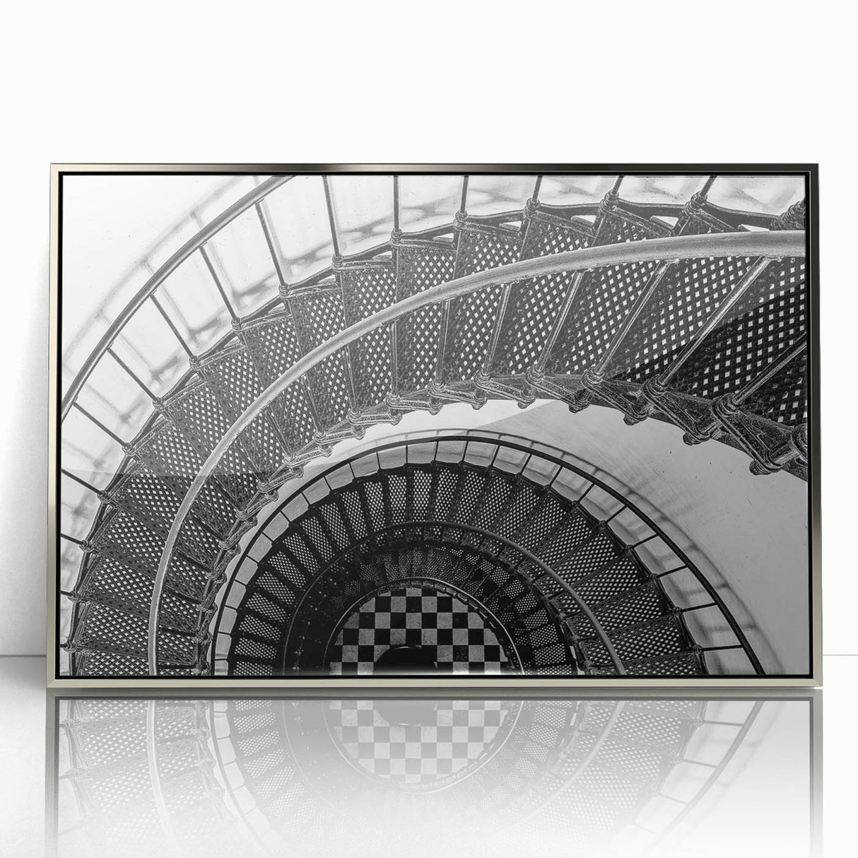 Mid-century modernist art featuring a spiral staircase in monochrome, acrylic print framed in silver.