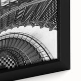 Close-up of a black wall art featuring a large, textured staircase design in colorful hues, ideal for living room decor.