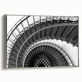 Framed canvas featuring a black and white vintage poster of a spiral staircase, ideal for modern office decor.