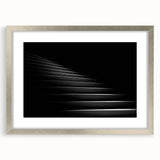 Textured art featuring abstract swirling staircase in muted grays and whites on a silver-framed mat, ideal for bedroom art.