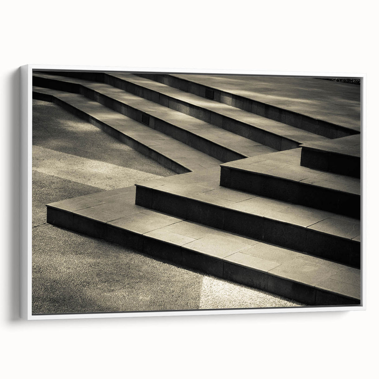 Vintage poster art of a spiral staircase in black and white on a framed canvas, ideal for living room decor.