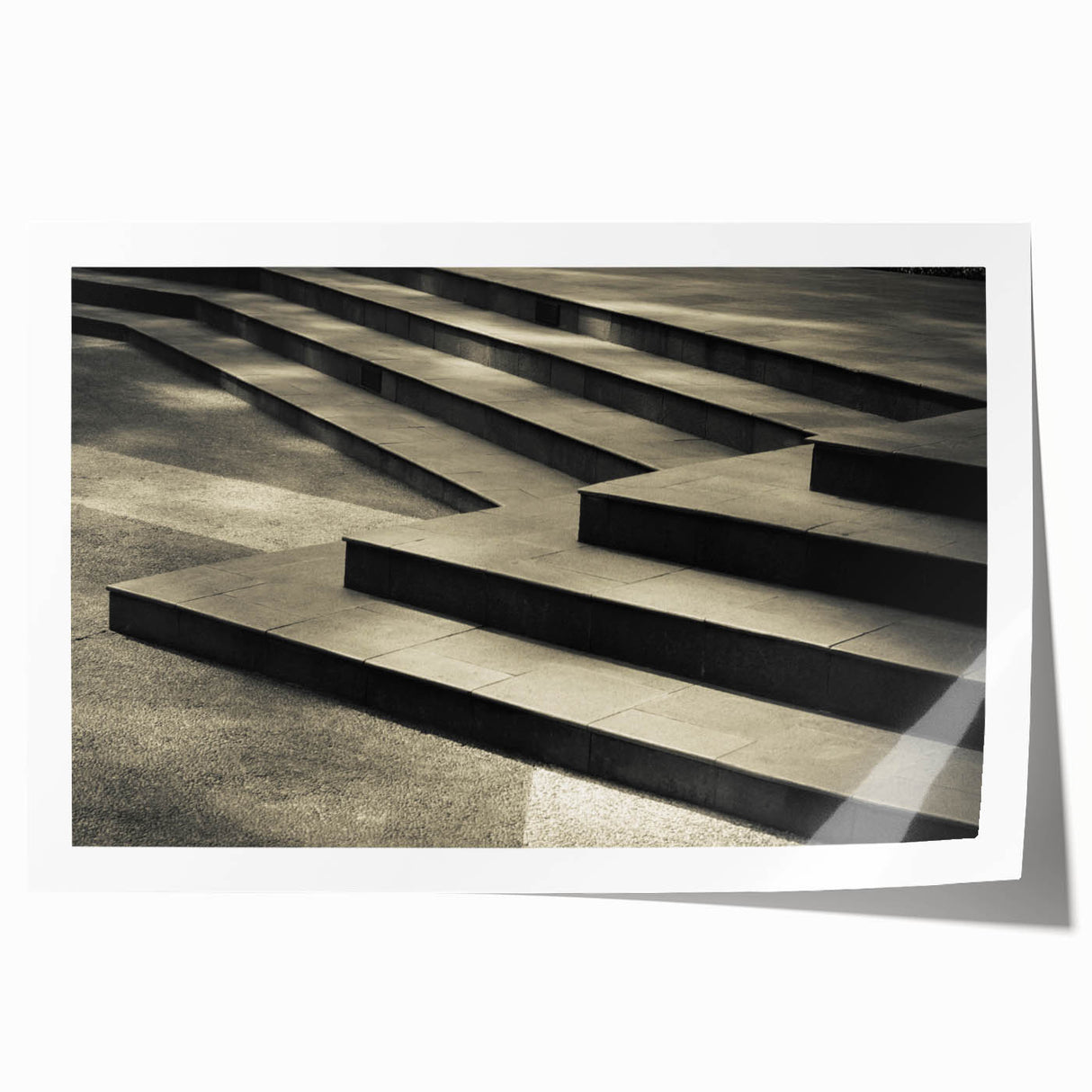 Rolled print of a spiral staircase in grayscale, suitable as art wall for dining room or classy bathroom.