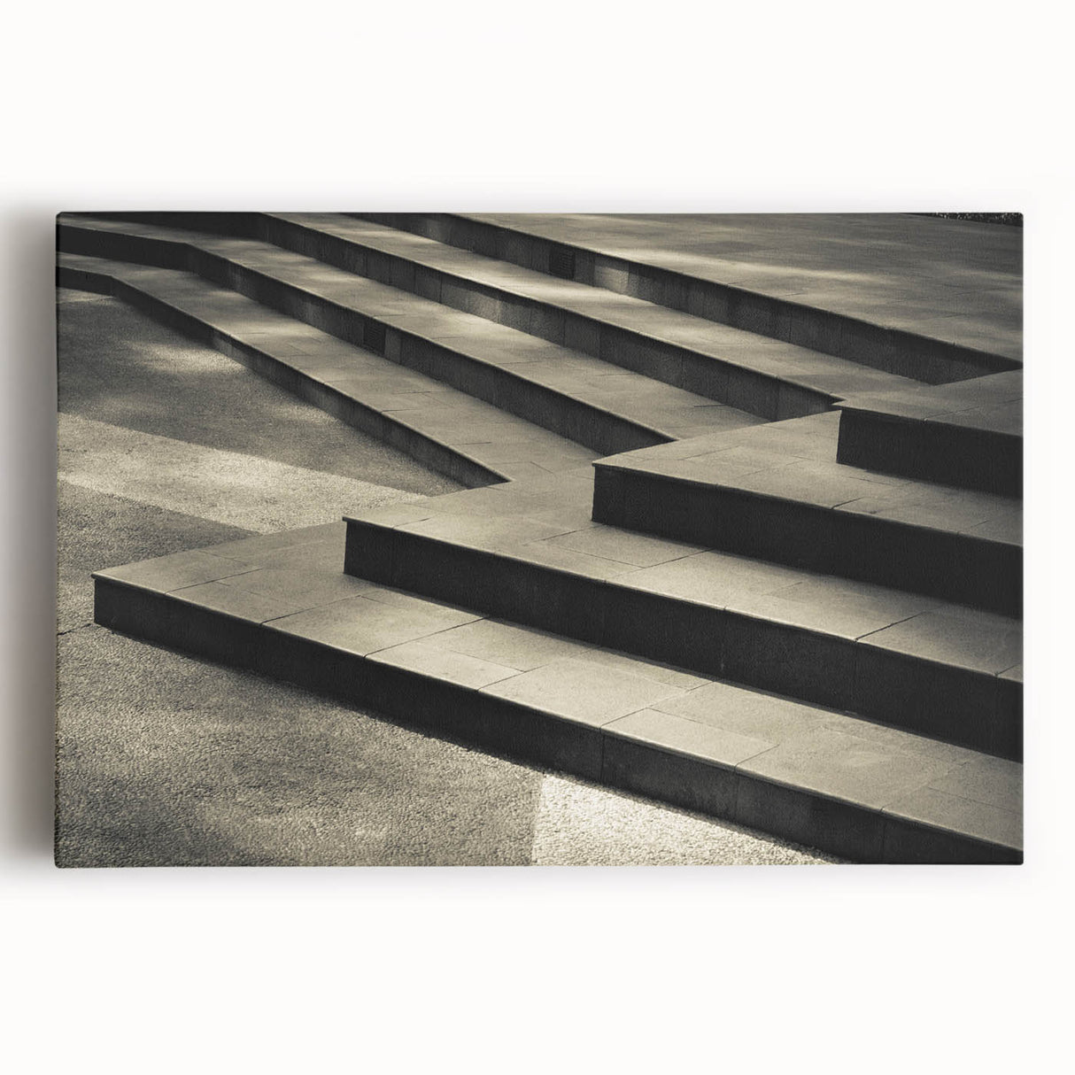 Black and white photograph of a spiral staircase on stretched canvas, ideal for kitchen wall art.