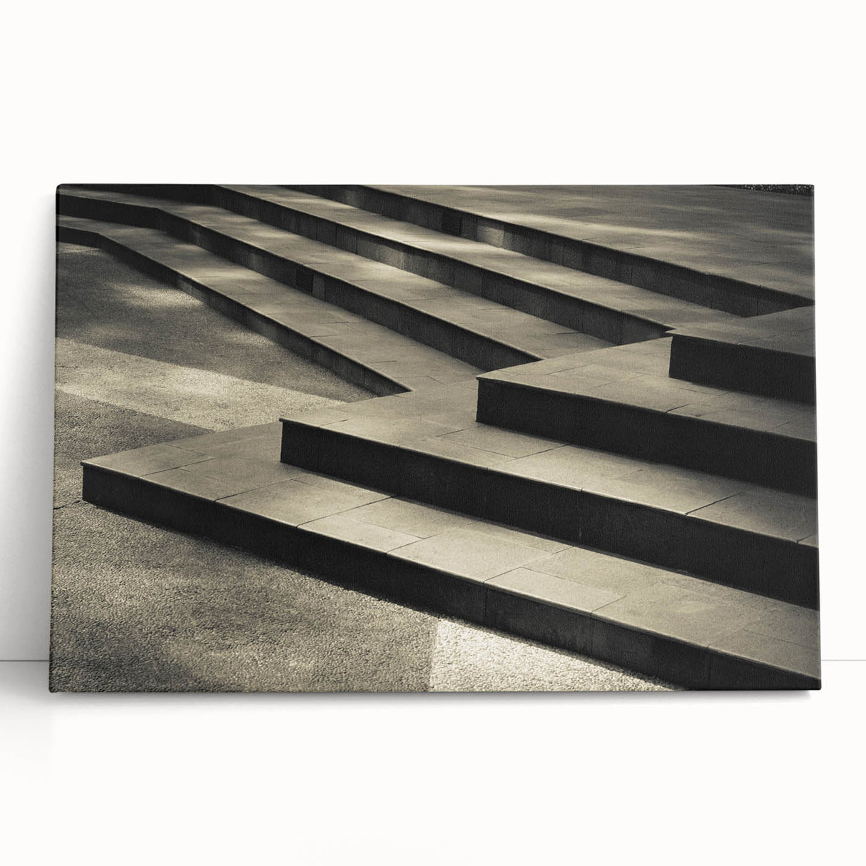 Black and white photograph of a spiral staircase on stretched canvas, suitable as large art for kitchen or bedroom.