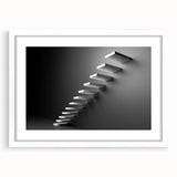 Abstract art print of spiraling staircase in muted gray, framed in white, ideal for modern bedroom or dining room decor.