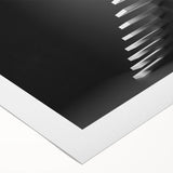 Art deco poster featuring a geometric staircase design in black and white on rolled canvas.