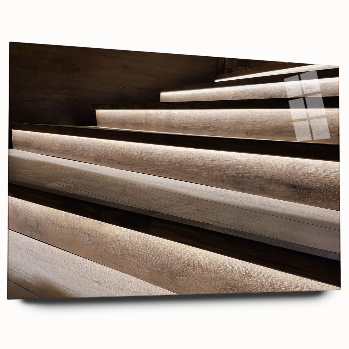 Large abstract wall art of a spiral staircase in muted gray tones on acrylic glass.