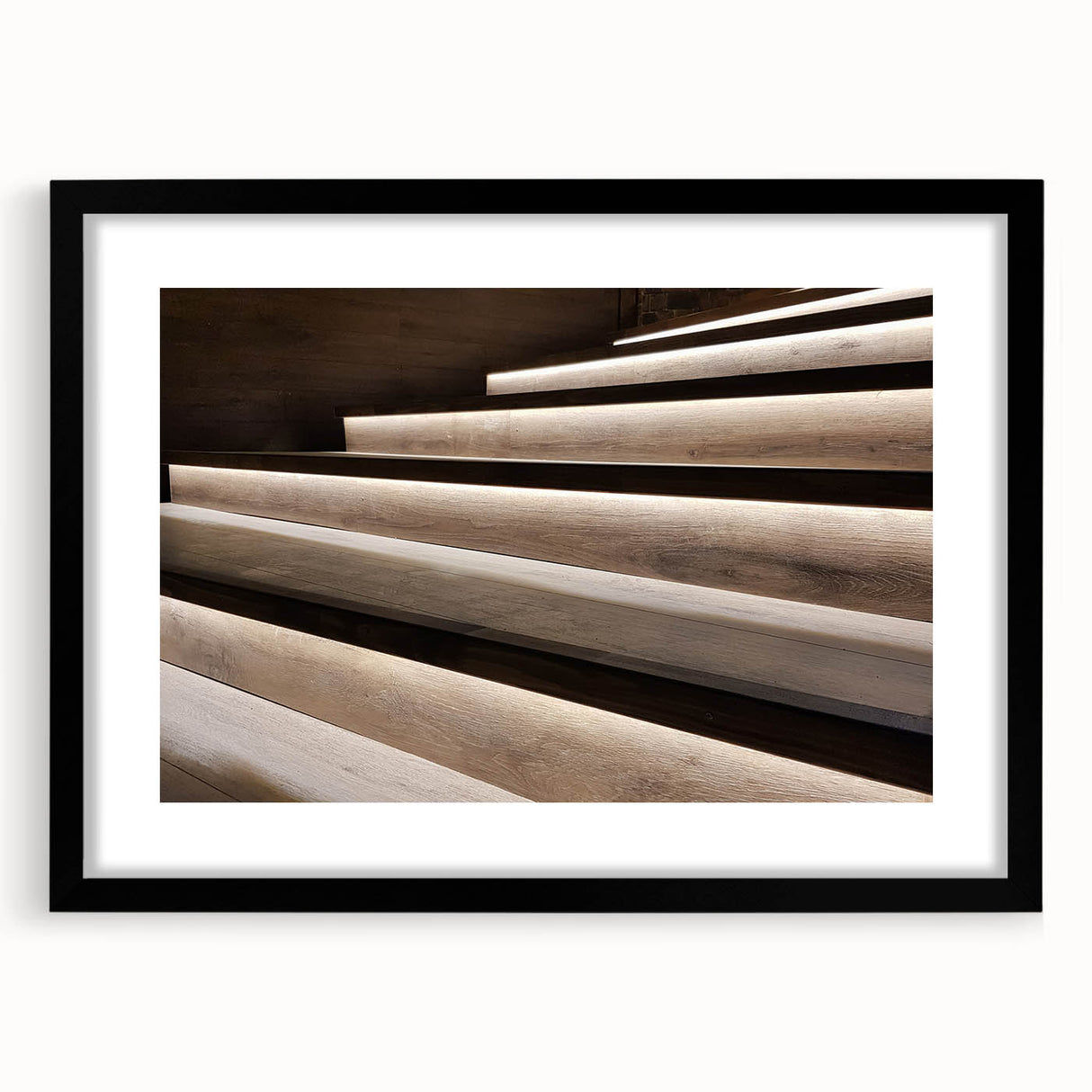 Extra large colorful abstract art print of a spiral staircase in vibrant hues on a black framed canvas.