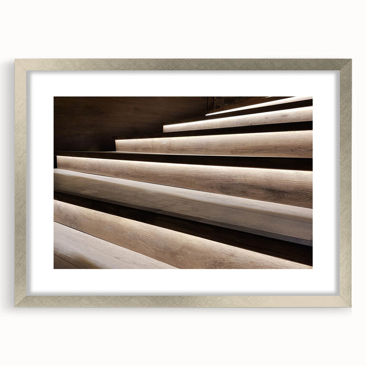 Textured abstract art print of a spiral staircase in muted gray tones on a framed canvas, suitable for bedroom decor.
