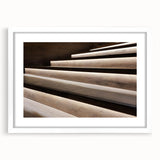Abstract art print of a spiral staircase in monochrome, framed with a white mat, suitable for bedroom or dining room decor.