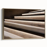 Framed canvas featuring a vintage poster of a black and gold staircase in a landscape orientation.
