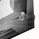Large abstract wall art featuring a spiral staircase in muted gray tones on acrylic glass, ideal for dining room decor.
