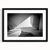 Extra large abstract art print featuring a colorful, textured depiction of a spiral staircase on a black framed canvas.