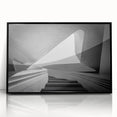 Large abstract wall art featuring a spiral staircase in black and white, acrylic print in a black frame.