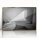 Mid-century modernist large art print of a spiral staircase in muted gold tones on framed acrylic.