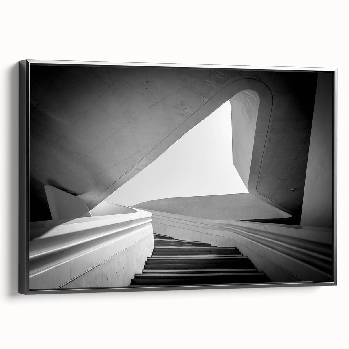 Black and white vintage poster art of a spiral staircase on framed canvas, ideal for bedroom wall decor.