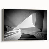 Framed canvas featuring a black and white vintage poster of a spiral staircase, ideal for modern office decor.