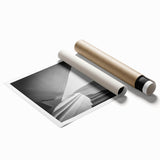 Extra large rolled print of a spiral staircase in muted gray tones, suitable for classy bathroom wall art.