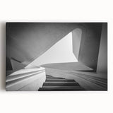 Black and white photograph of a spiral staircase on a stretched canvas, ideal for kitchen wall art.