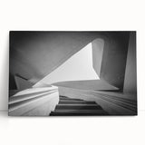 Black and white photo of a spiral staircase on a large stretched canvas, suitable as kitchen wall art or for a bedroom.