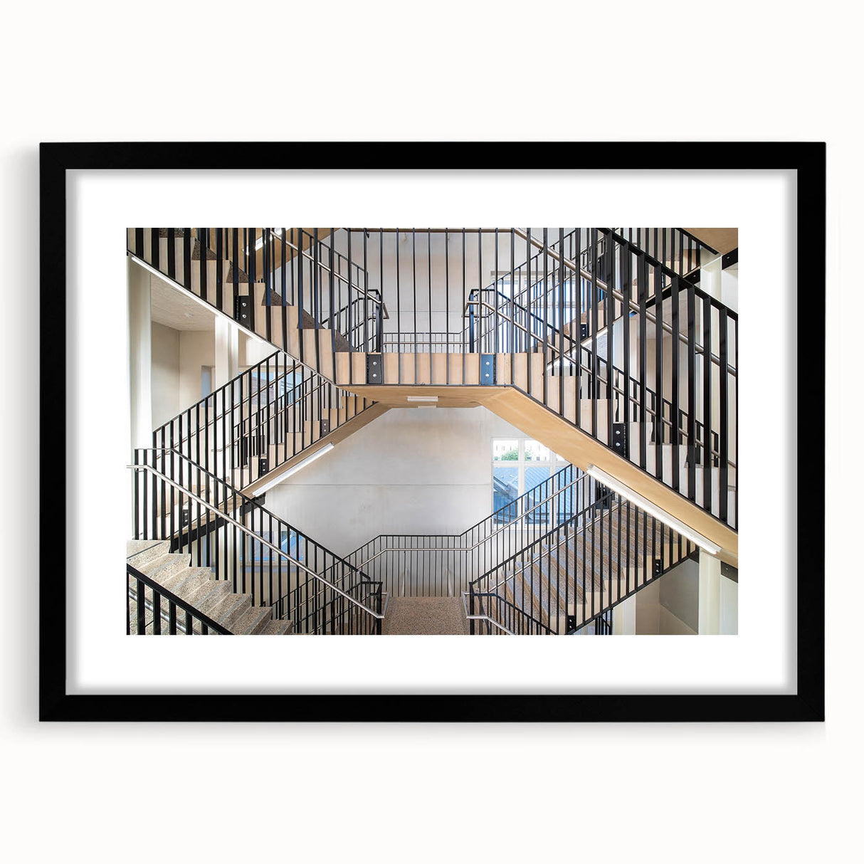 Abstract art print featuring a colorful, textured staircase design on a large black-framed canvas.
