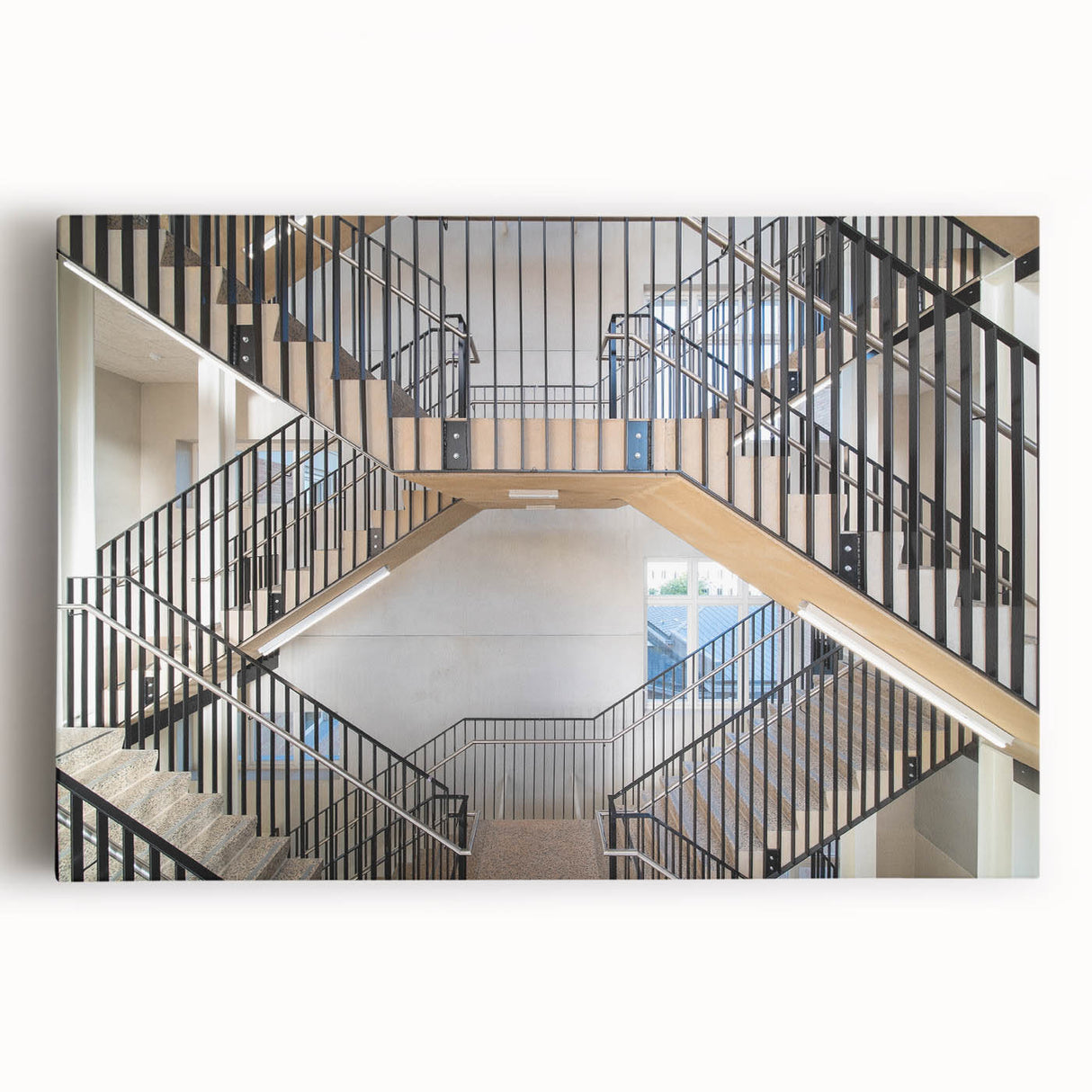 Black and white photograph of a spiral staircase on stretched canvas, suitable as large kitchen wall art.
