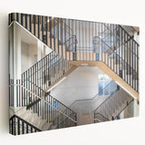 Spiral staircase design in grayscale on stretched canvas, suitable for modern kitchen wall art.