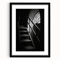 Extra large abstract art print featuring a colorful, textured depiction of a spiral staircase on a framed black mat.