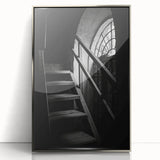 Mid-century modernist art featuring a spiral staircase in muted tones on a framed acrylic.