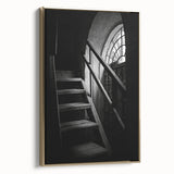 Framed canvas featuring a vintage poster-style staircase design in black, ideal for bedroom wall art.