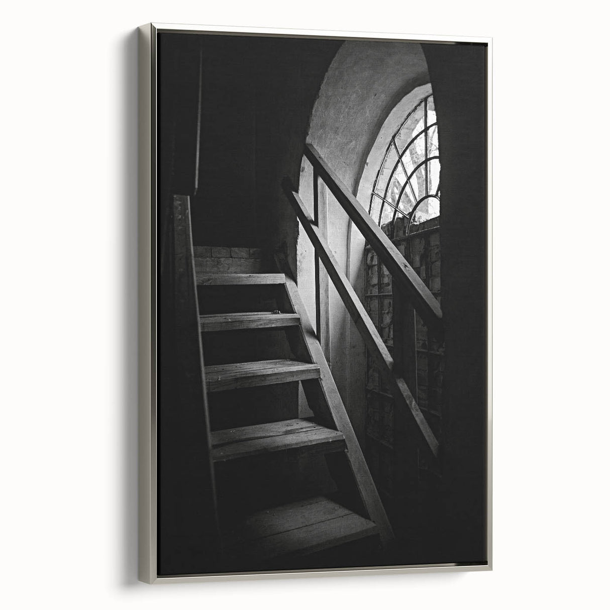 Framed canvas featuring a black and white spiral staircase in a vintage poster style.