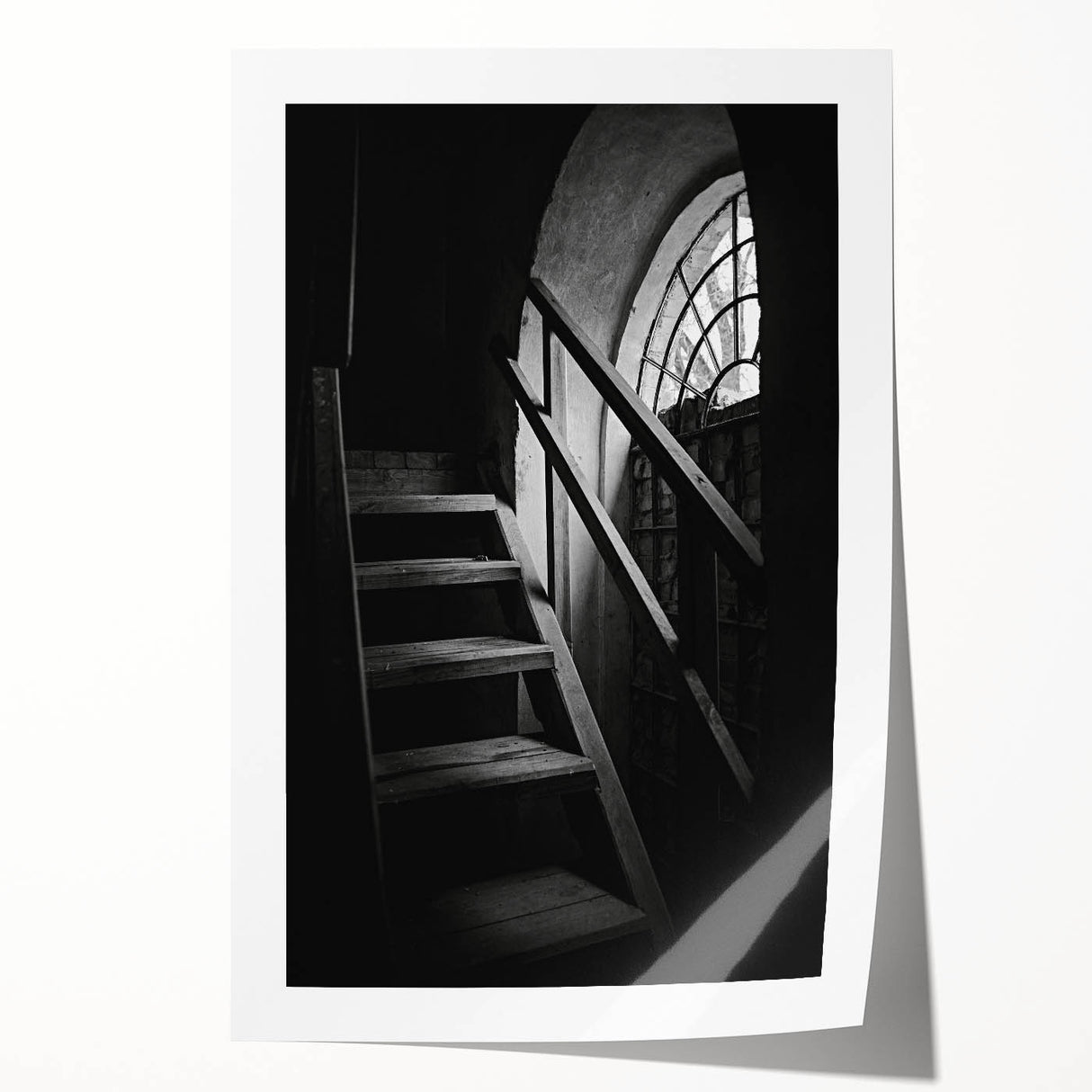 Rolled print of a spiral staircase in muted gray tones, suitable as art wall dining room decor.