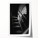 Rolled print of a spiral staircase in muted gray tones, suitable as art wall dining room decor.