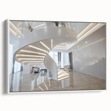 Vintage poster art of a spiral staircase in black and white on a framed canvas.