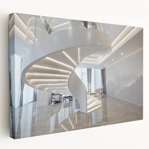 Side view of a large stretched canvas featuring a black and white architectural staircase design.