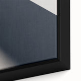 Framed canvas featuring a close-up of a spiral staircase in black, with colorful, textured accents.