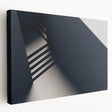 Spiral staircase with detailed railing in black and white on stretched canvas, suitable for kitchen wall art.