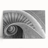 Black and white photo of a spiral staircase on stretched canvas, ideal for kitchen wall art or bedroom ambiance.
