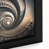 Close-up of a textured black wall art depicting a spiral staircase, in vibrant colors on a framed canvas.