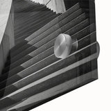 Large abstract wall art on acrylic glass featuring a spiral staircase in monochrome, ideal for dining room art.
