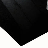 Black and white photo of a spiraling staircase on stretched canvas, suitable for bedroom wall art.