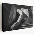 Spiral staircase in black and white on stretched canvas, suitable for kitchen wall art.