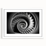 Abstract art print of a spiral staircase in monochrome, framed in white, ideal for modern bedroom or dining room decor.