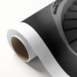 Art deco poster of a spiral staircase in black and white, printed on rolled canvas.