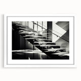 Abstract art print of a spiral staircase in monochrome, framed with a white mat, suitable for dining room decor.