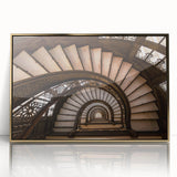 Mid-century modernist art depicting an architectural staircase in gold and black tones on framed acrylic.