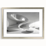 Textured abstract art print of a spiral staircase in muted gray tones, framed in silver, suitable for bedroom decor.