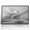 Large abstract wall art featuring a spiral staircase in black and white, framed in acrylic.