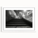 Abstract art print of a spiral staircase in muted gray hues on a framed white mat, ideal for dining room decor.